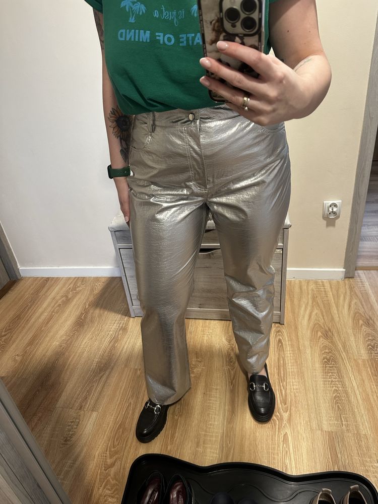 Srebrne, nowe świecące spodnie Gina Tricot 44