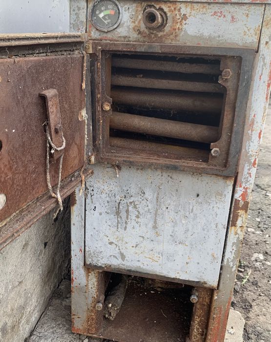 Котел газовий, твердопаливний