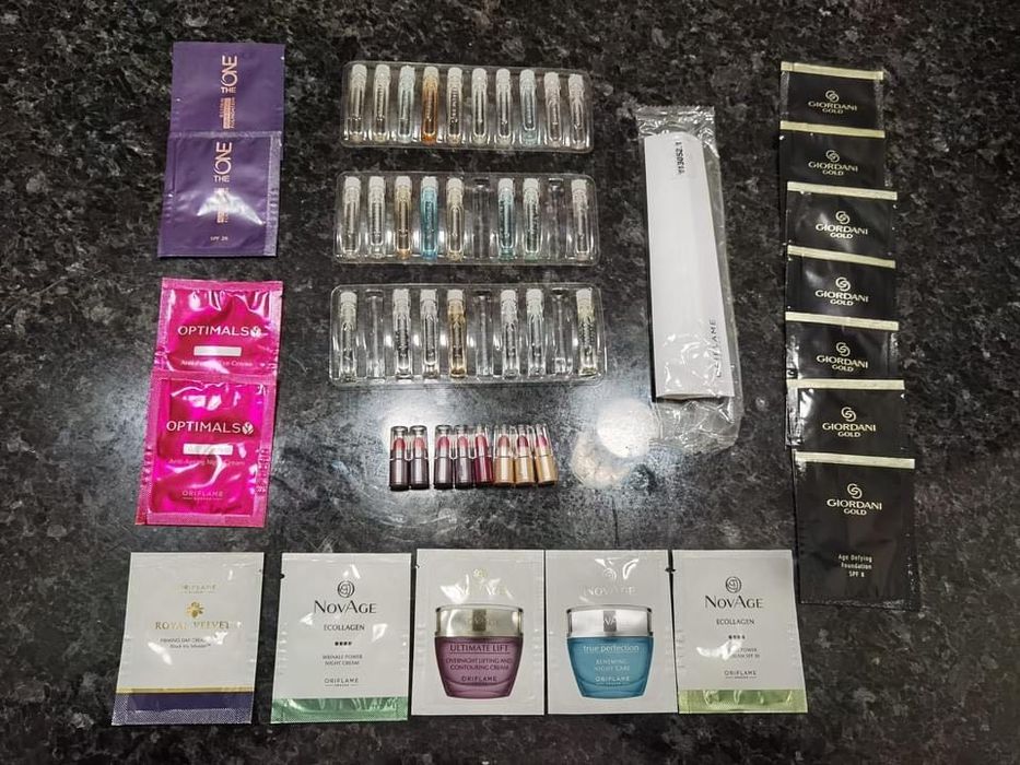 Bolsa + 25 Amostras (Perfumes + Cremes + Bases + Batons)