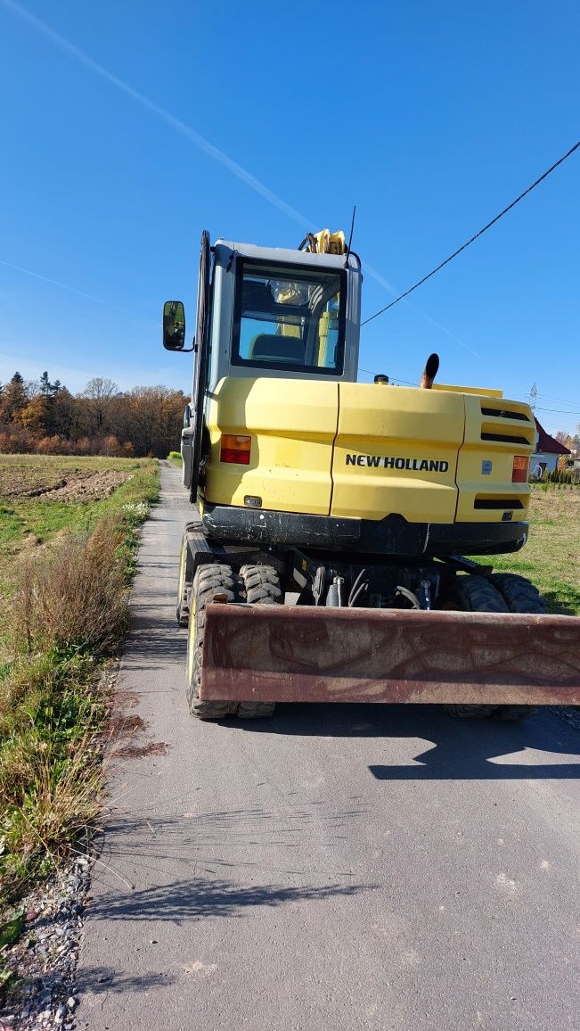 Wynajem koparki kołowej NEW HOLLAND MH 2.6 wypożyczenie koparki 10Ton