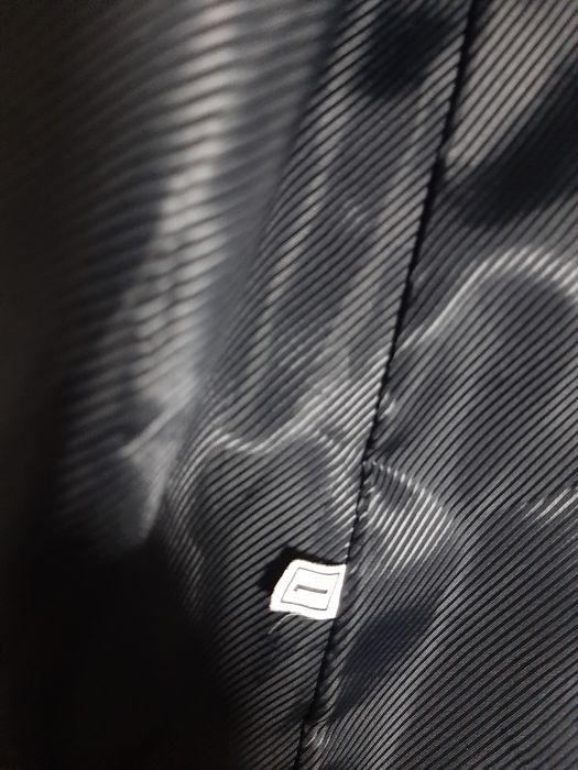 Меховая жилетка женская