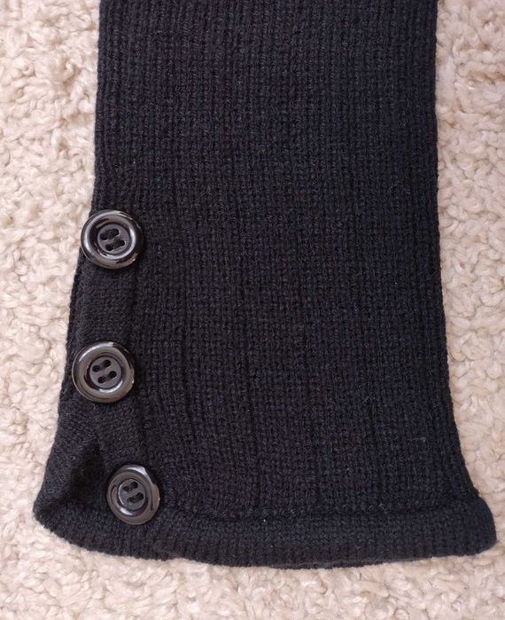 Nowe ocieplacze z guzikami na nogi, kolor Czarny.