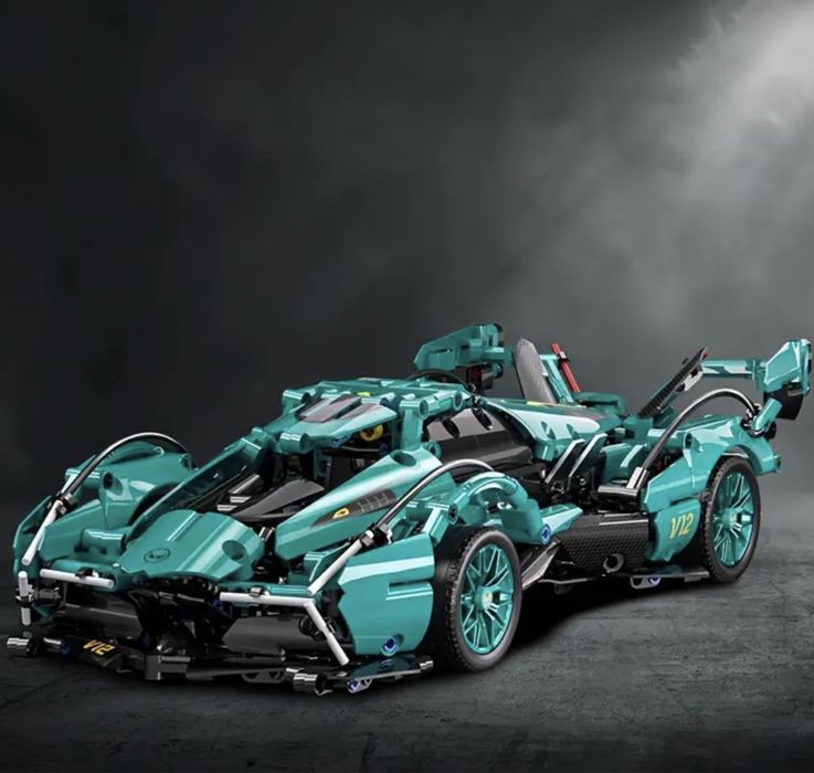Контсруктор 1300 деталей спортивна машинка 36*17см lego technic бірюза