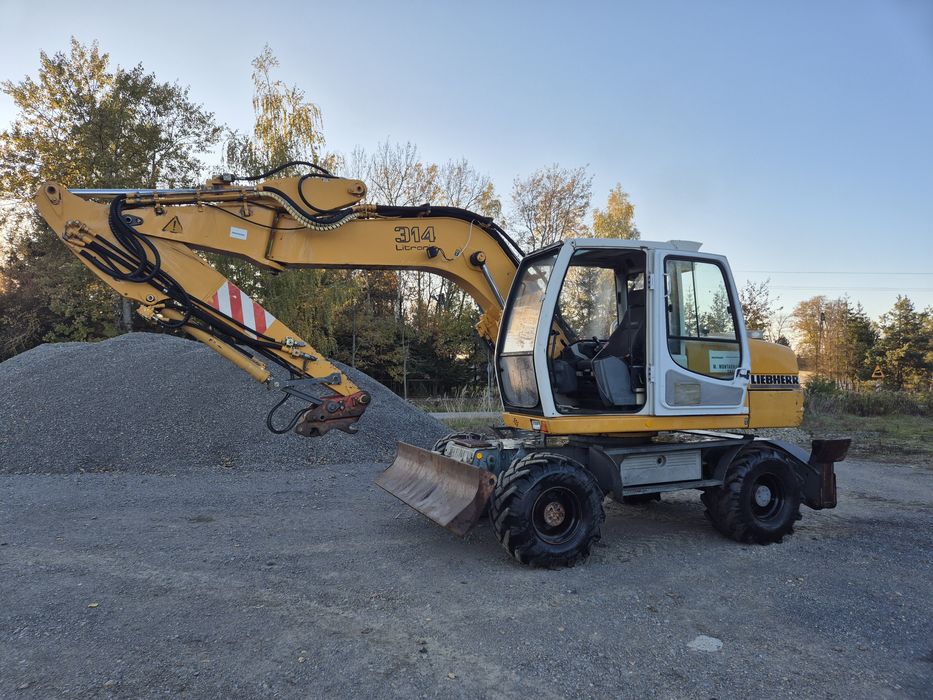 Liebherr  A 314 sprowadzona  książką serwisowa