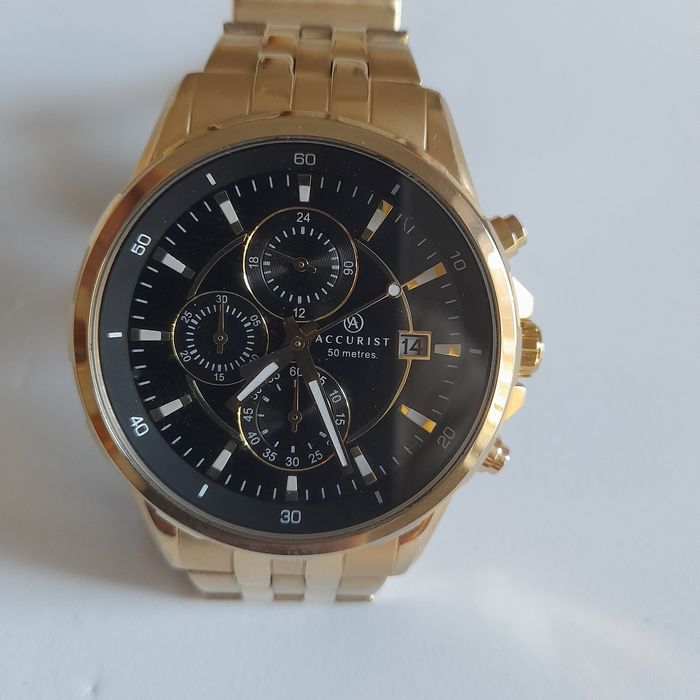 Relogio dourado accurist
