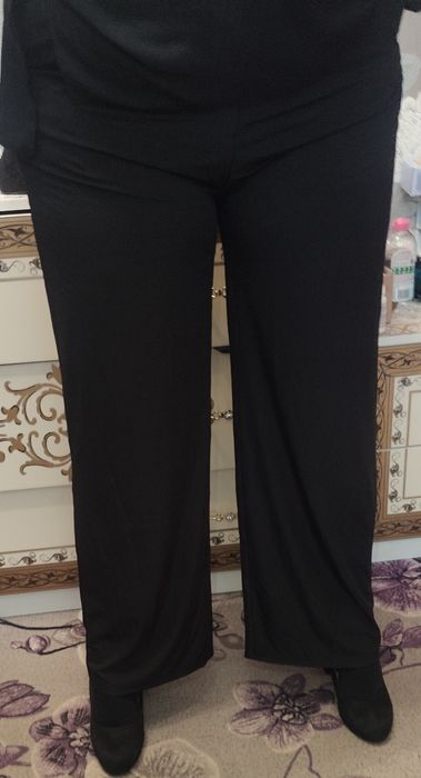 Штани клеш. Черного кольору