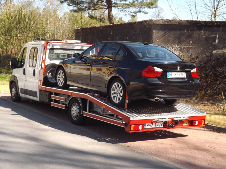 Autolaweta Polska Zagranica Laweta Pomoc Drogowa Holowanie 24H