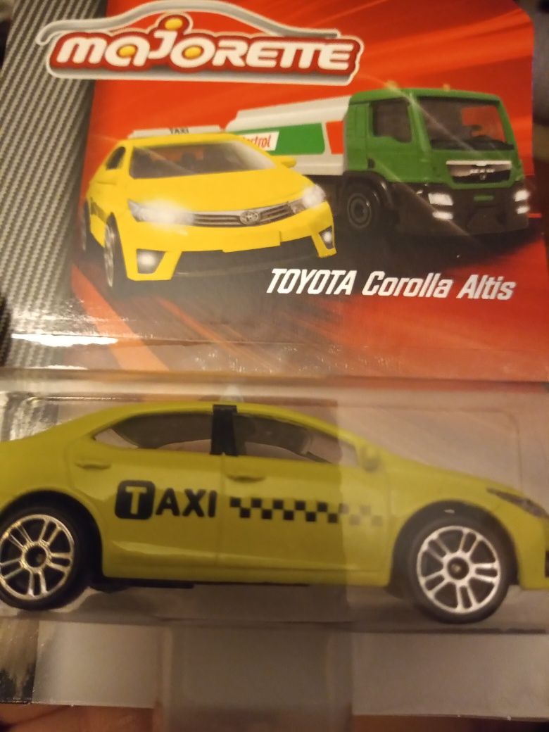 Model Majorette Toyota Corolla Altis TAXI seria City