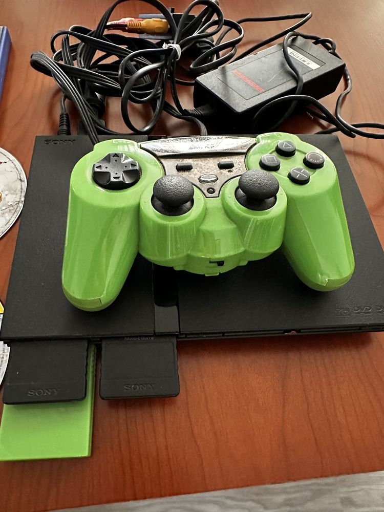 PlayStation 2 com vários jogos