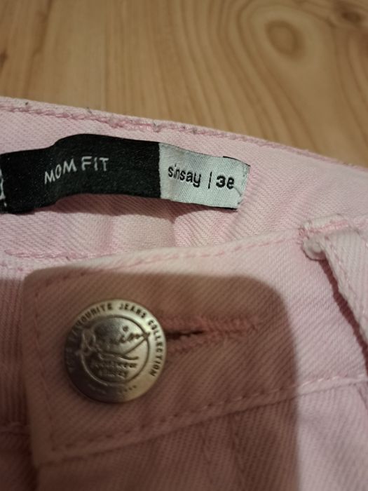 Spodnie z przetarciami  rozm M