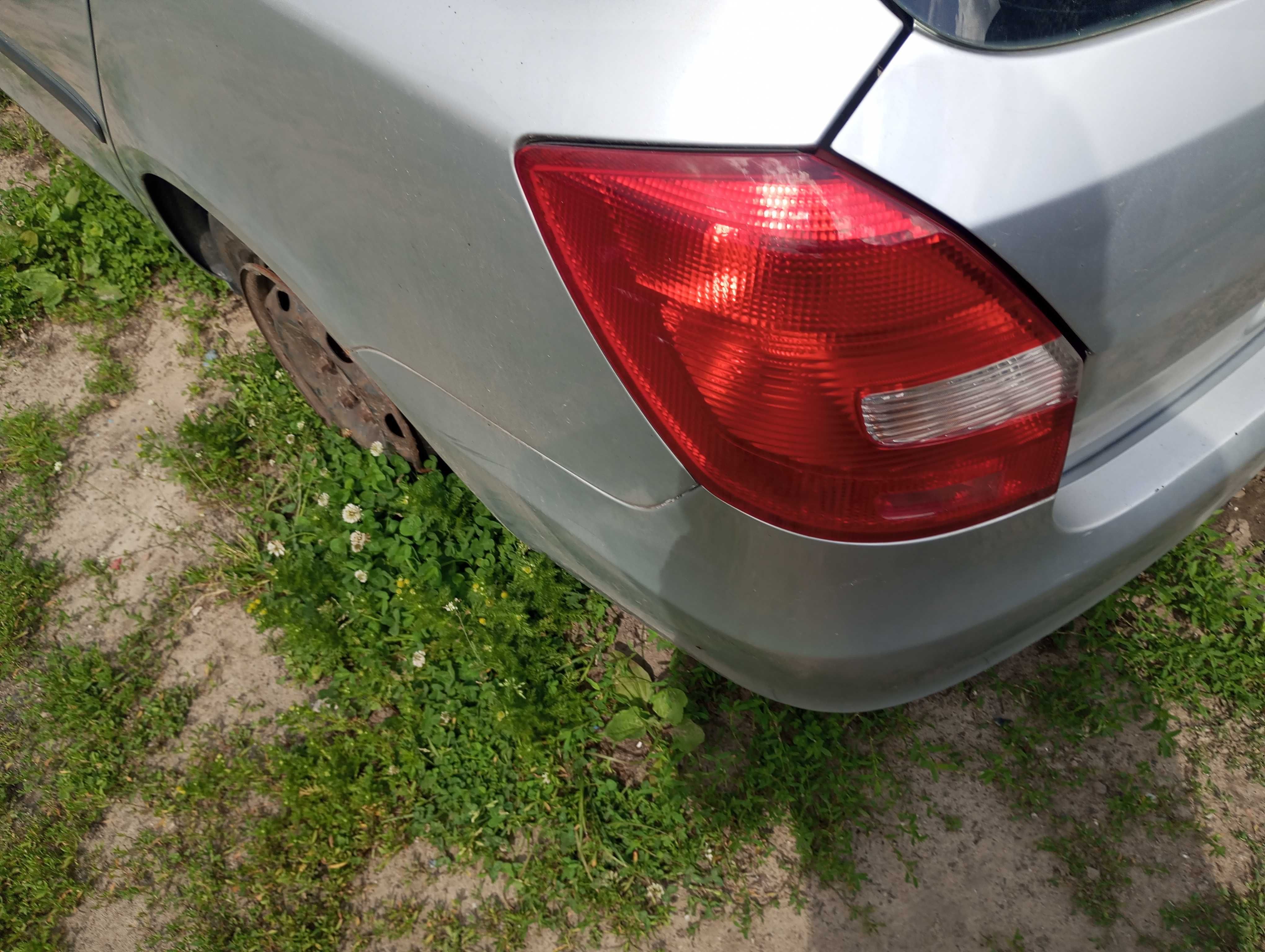 fabia 2 klapa tył lampa zderzak  lewa prawa  srebrna 9156