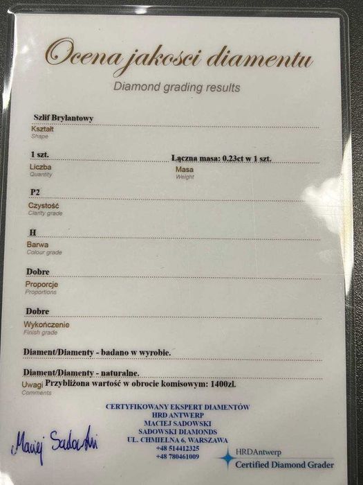 Złoty pierścionek z brylantem 0.23 ct