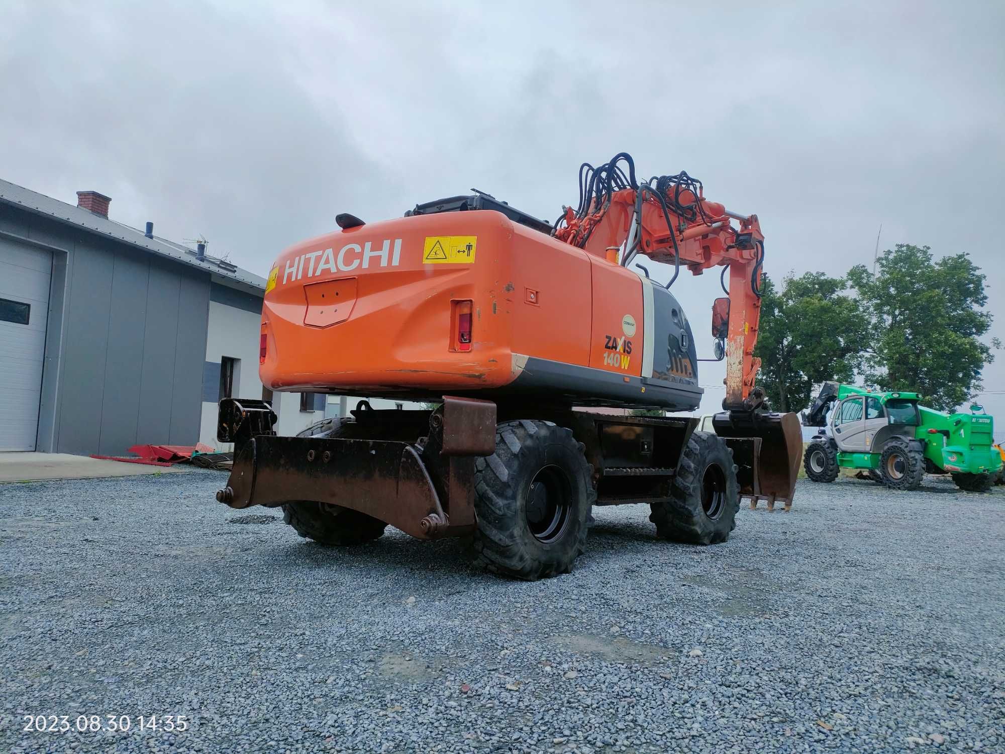 Koparka kołowa Hitachi Zaxis 140 W(cat,liebherr) W rok 2011