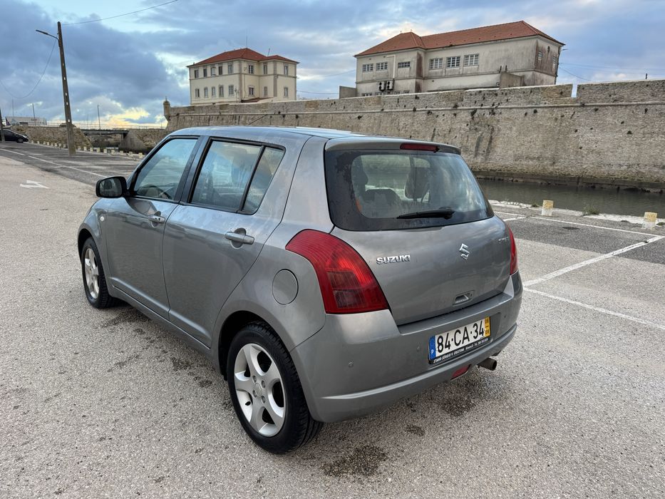 Suzuki Swift 2006 Automatico poucos kms 4.8 l/100 mto economico