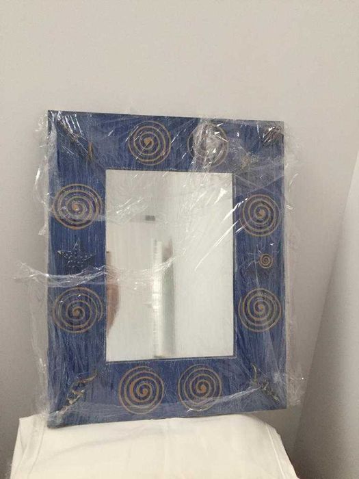 espelho azul com motivos de mar