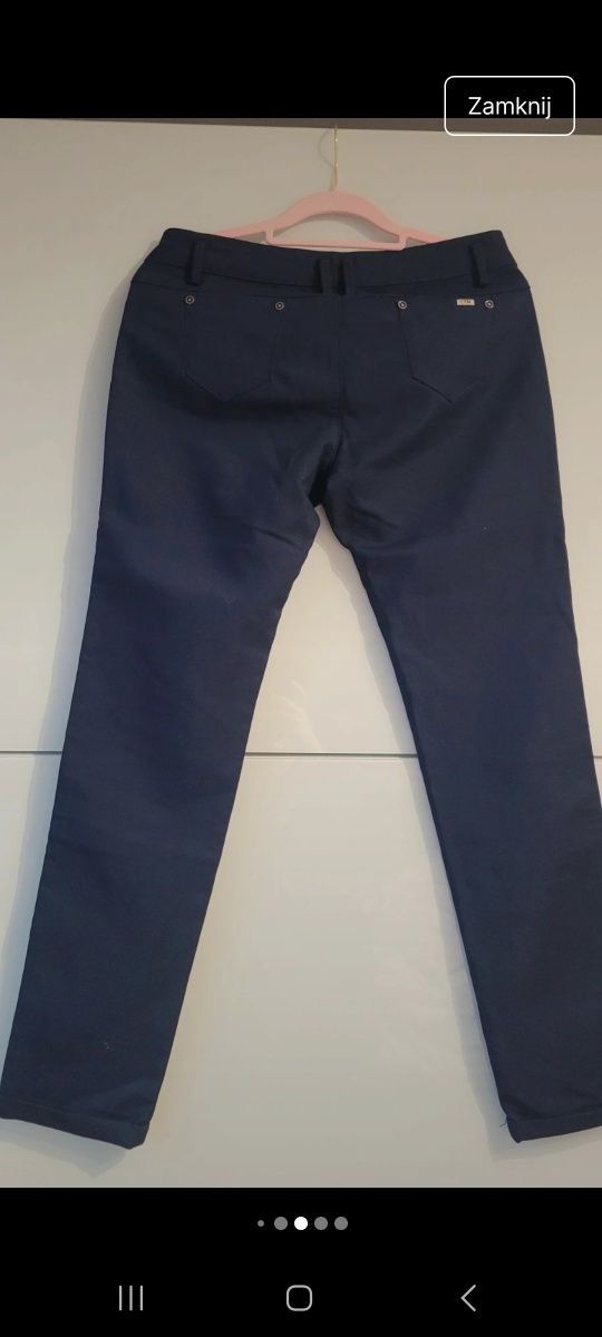 Eleganckie spodnie granatowe 40-44 nowe bez metki