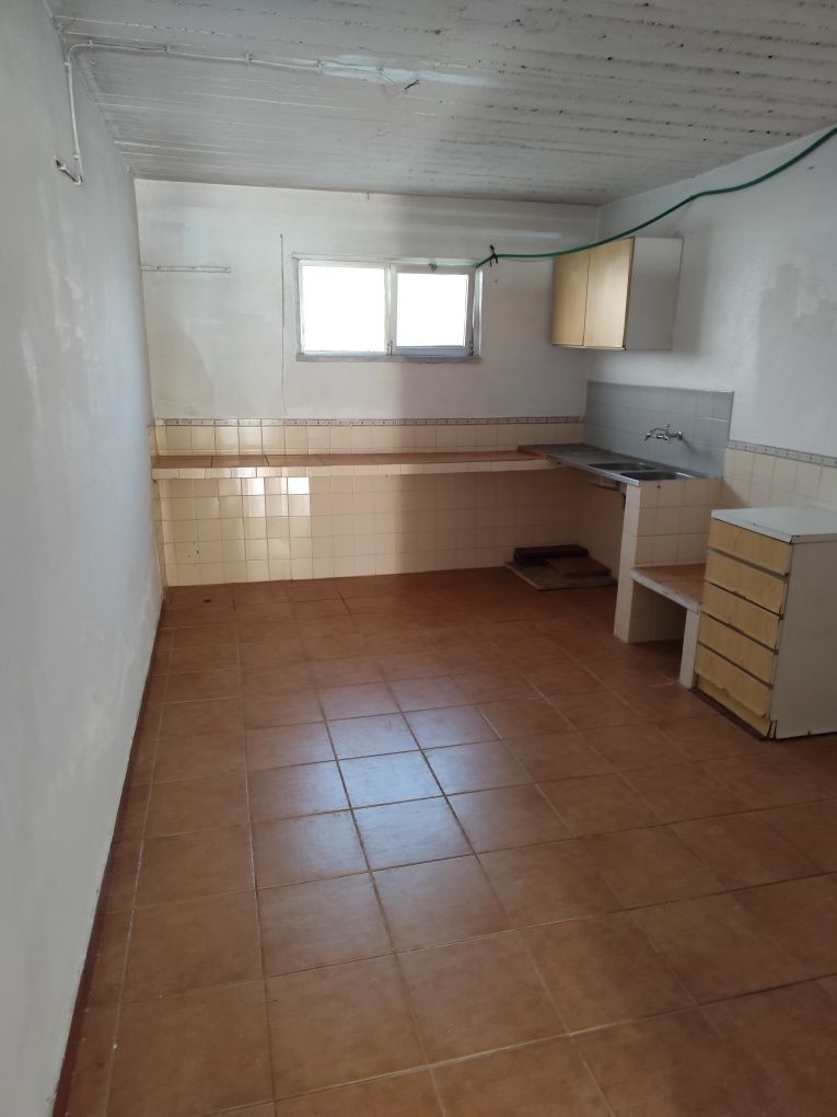 Espaço para arrumos