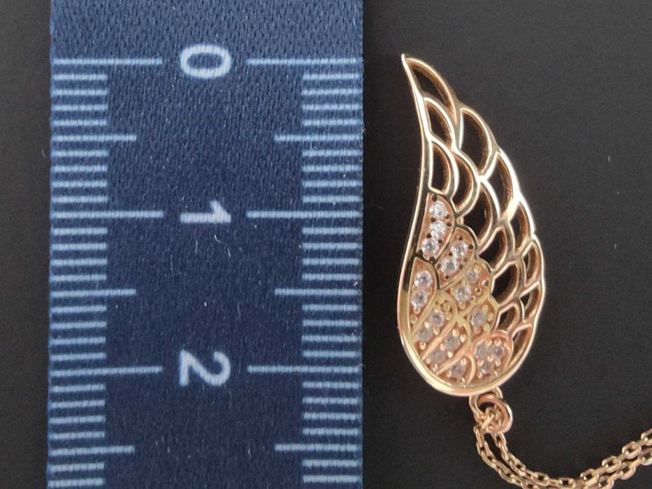 Naszyjnik złoty pióro z cyrkoniami