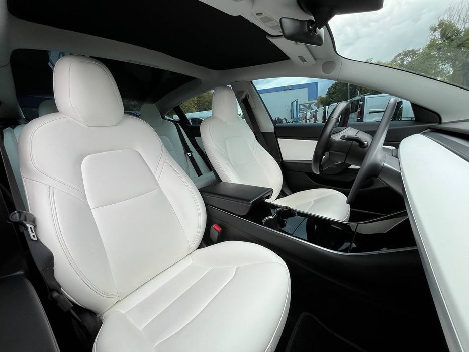 Tesla model 3 long reng dyal motors