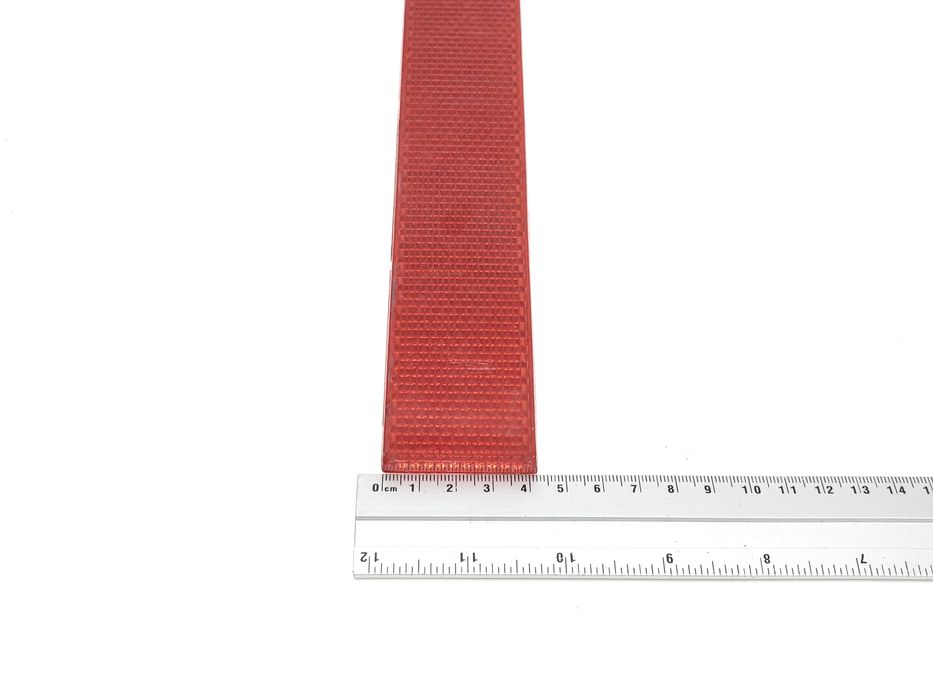 Odblask czerwony 24 x 4 cm