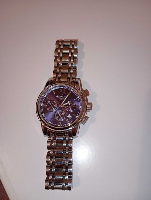 Годинник новий Guanqin