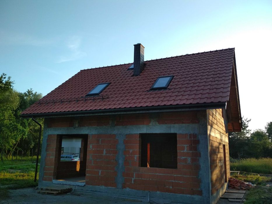 Montaż płotków przeciwśniegowych śniegołapów drabinek zabezpieczeń