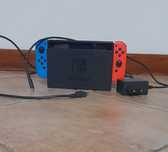 Nitendo Switch + suporte comandos+ capa original + 3 jogos + 1 comando