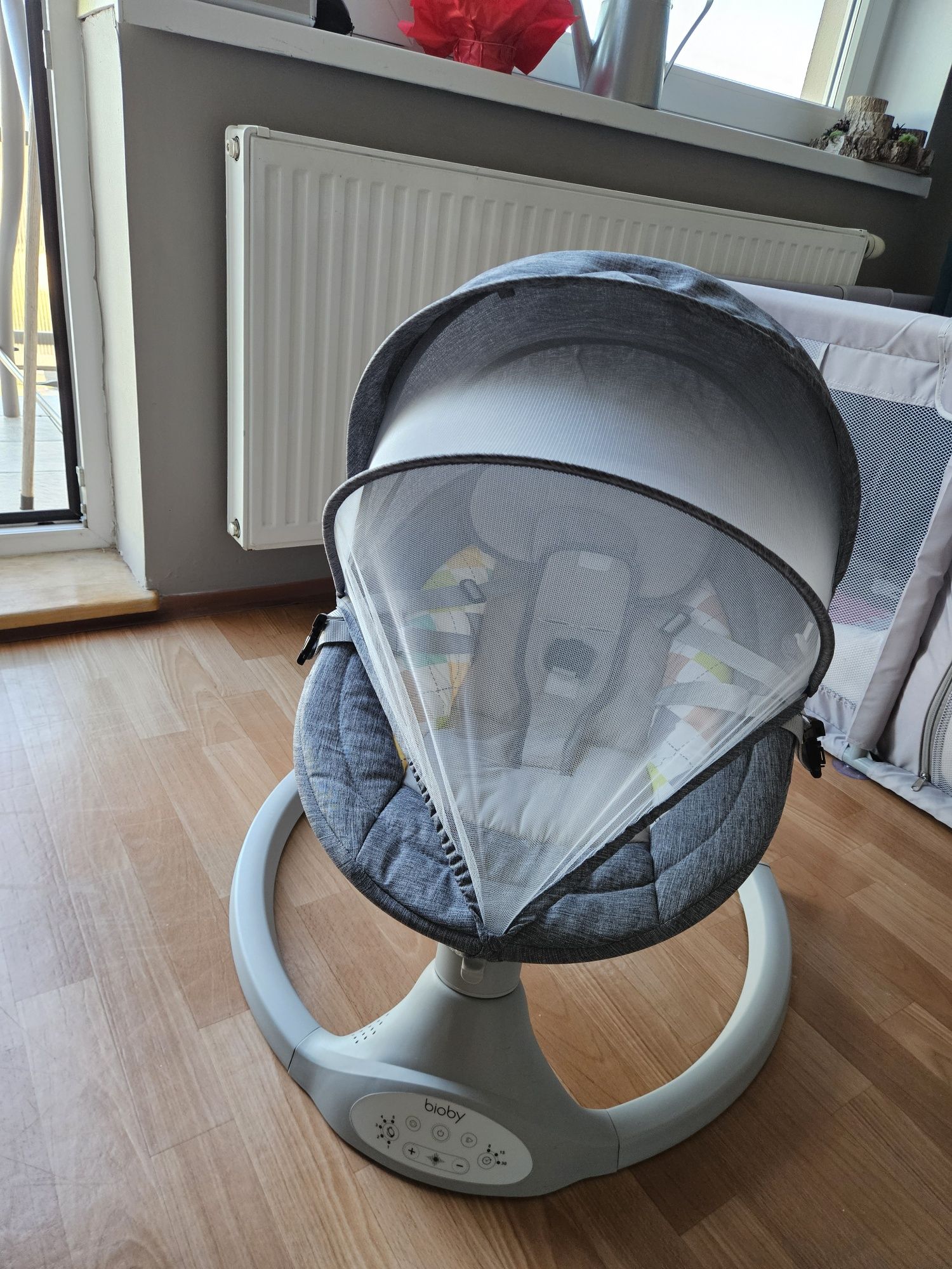 Bujaczek leżaczek elektryczny Bioby 2-9kg 0-12 miesięcy + pilot