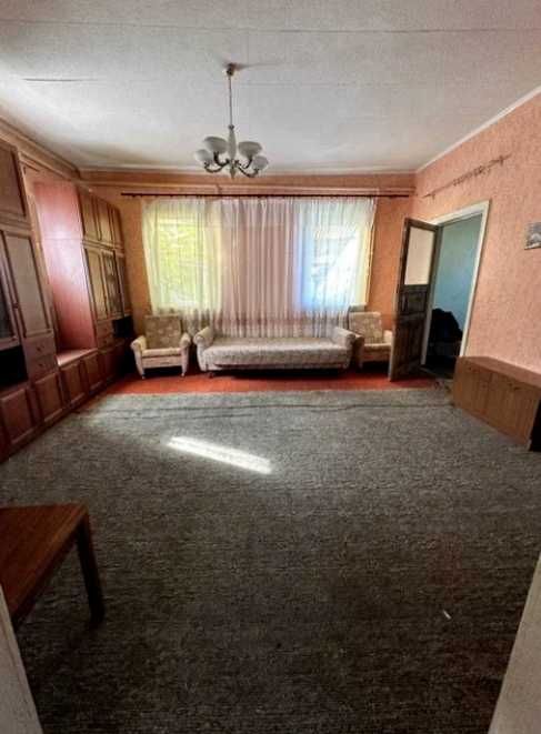 Продам кирпичный Дом на поселке  Строителей в городе Каменское.