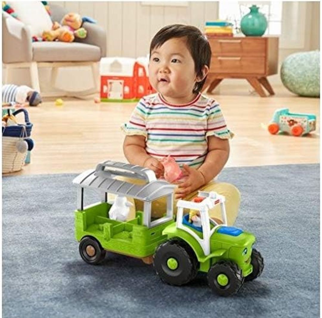 Fisher-Price Traktor Little People Farma Zwierzęta
Traktor z przyczepą