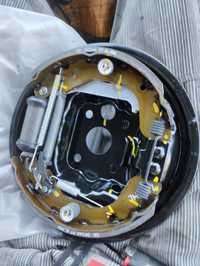 Гальмівна система Шевроле авео задня опорний диск в зборі з колодками