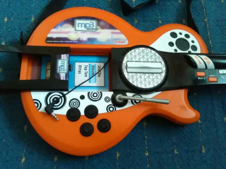 Gitara na baterie plus MP 3