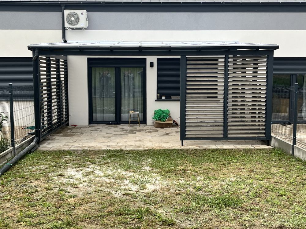 Zadaszenie tarasu z drewna pergola ruchome deseczki