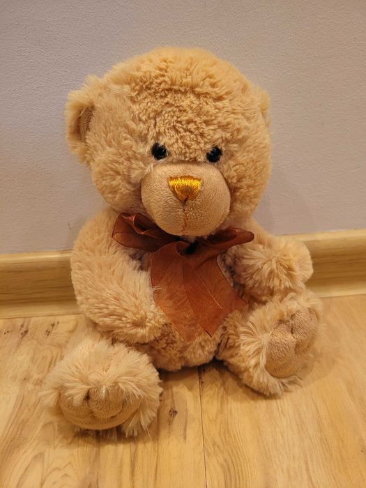 pluszowy miś maskotka w kolorze złotym