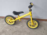 Żółty rower rowerek biegowy