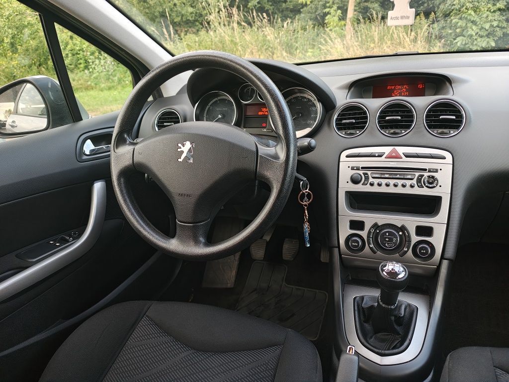 Peugeot 308SW 2009r. 1.4B 95KM 70kW