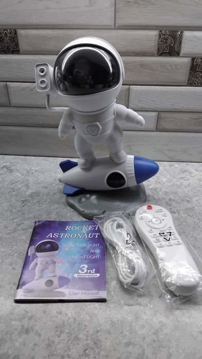 Музичний зоряний світильник і нічник космонавт Rocket Astronaut...