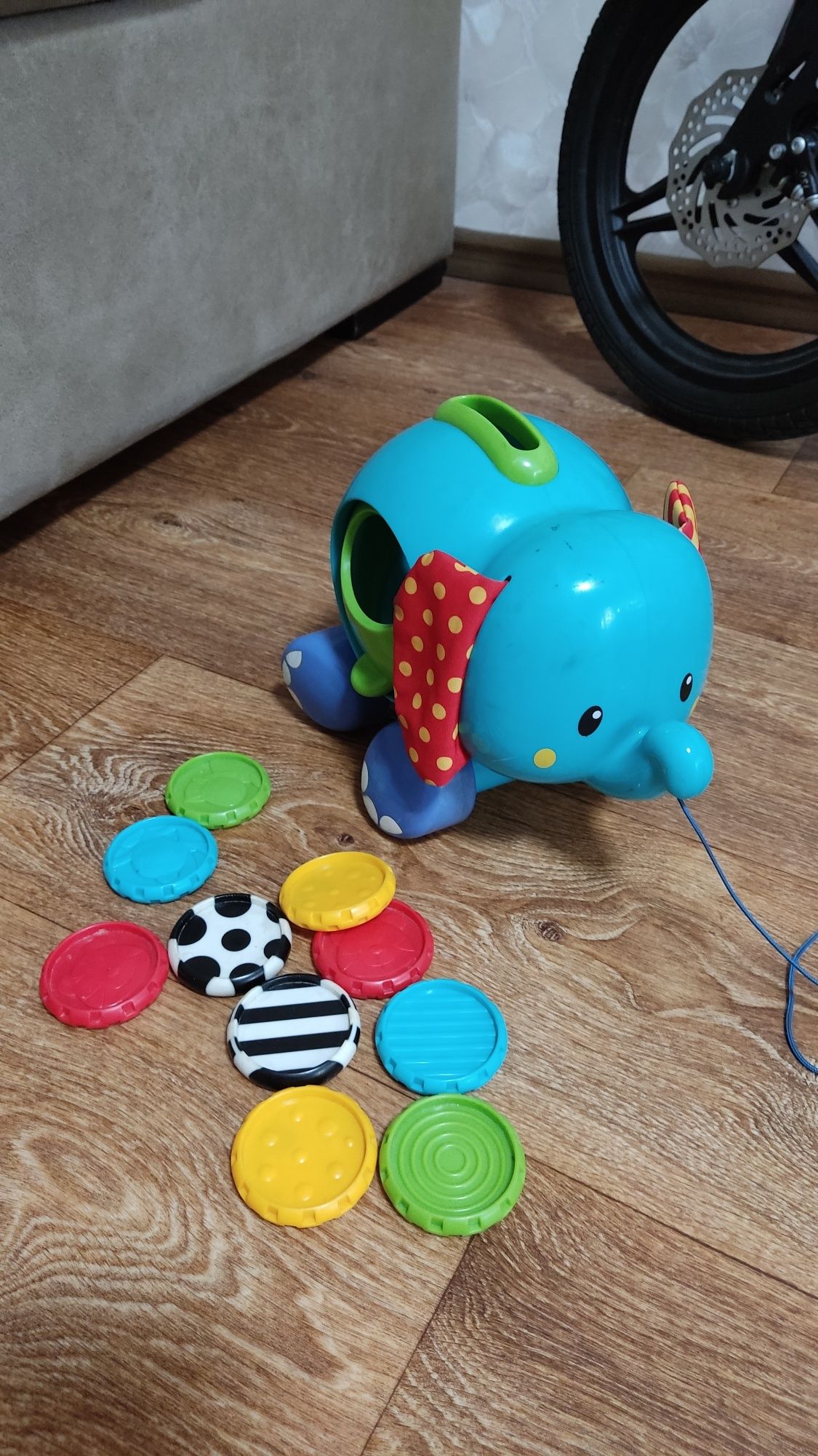 Детская игрушка слоник с монетами