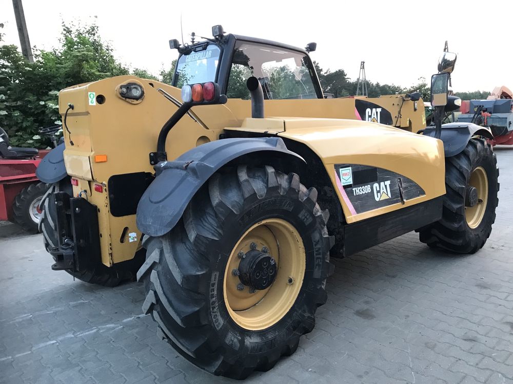 Ładowarka teleskopowam Cat TH 330 B klima 145 km z Niemiec JCB Manitou