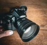 Nikon D5000 + Sigma 50mm (f1.4)+Sigma DC 18-200m + dodatki