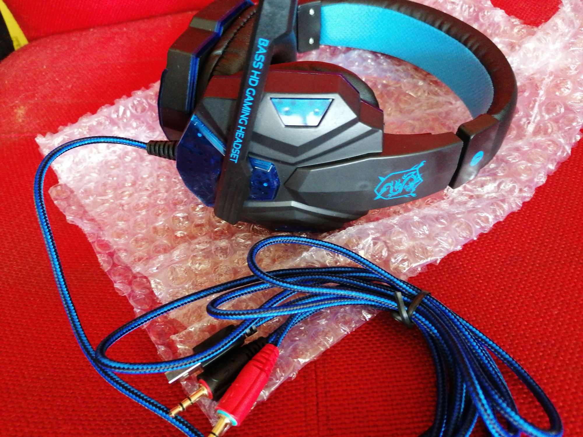 Auscultador Gaming com microfone preto/azul Novo com iluminação  azul