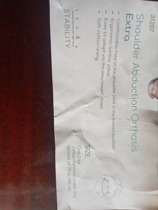 Фіксуюча пов'язка для відведення плеча