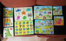 Jogos de encaixe/puzzles em madeira
