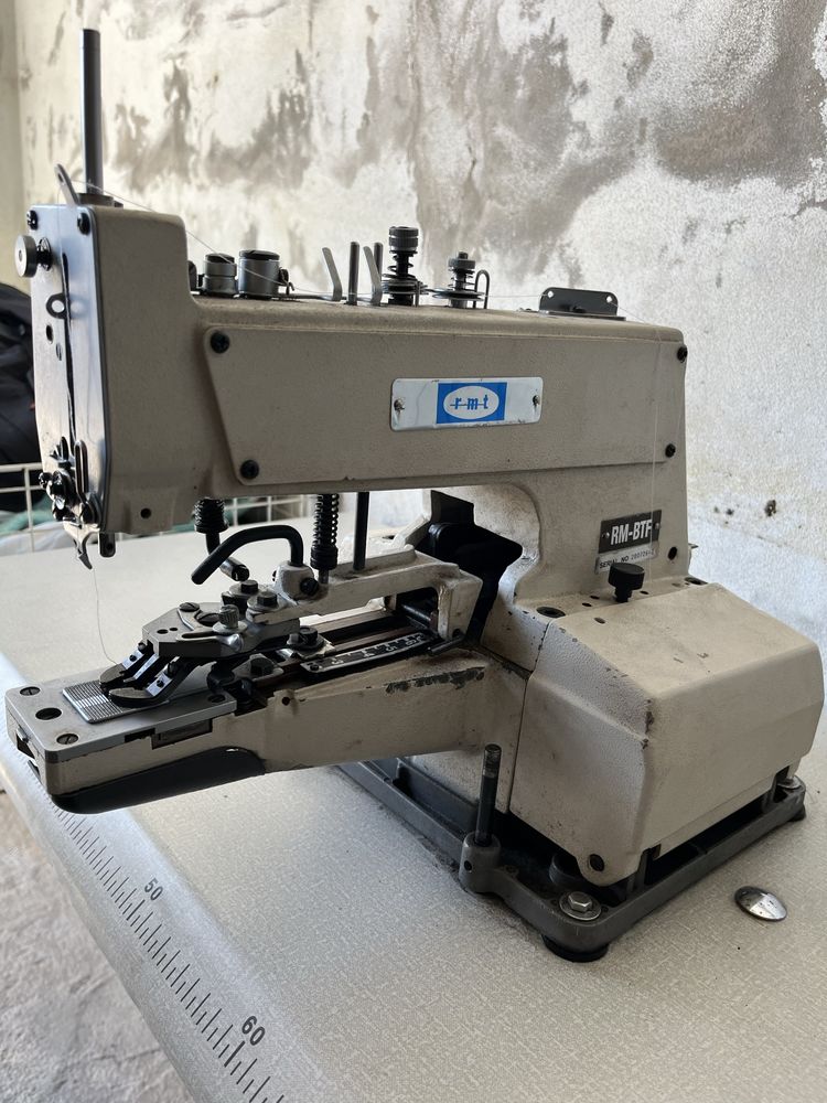 Máquina de pregar botões RMT