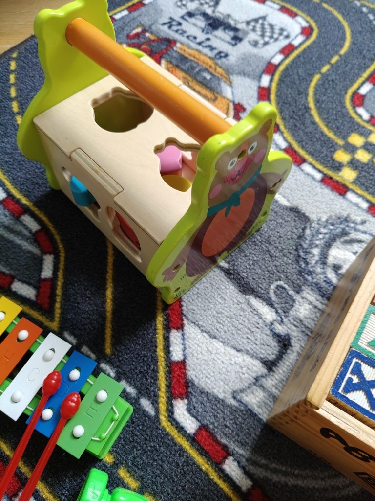 Zestaw edukacyjnych zabawek, drewniane klocki, sorter, pianino itp
