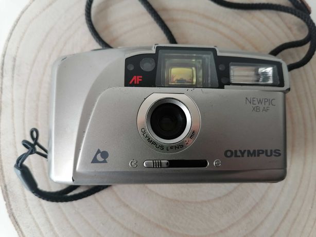 Máquina Fotográfica Olympus - Rolo fotográfico