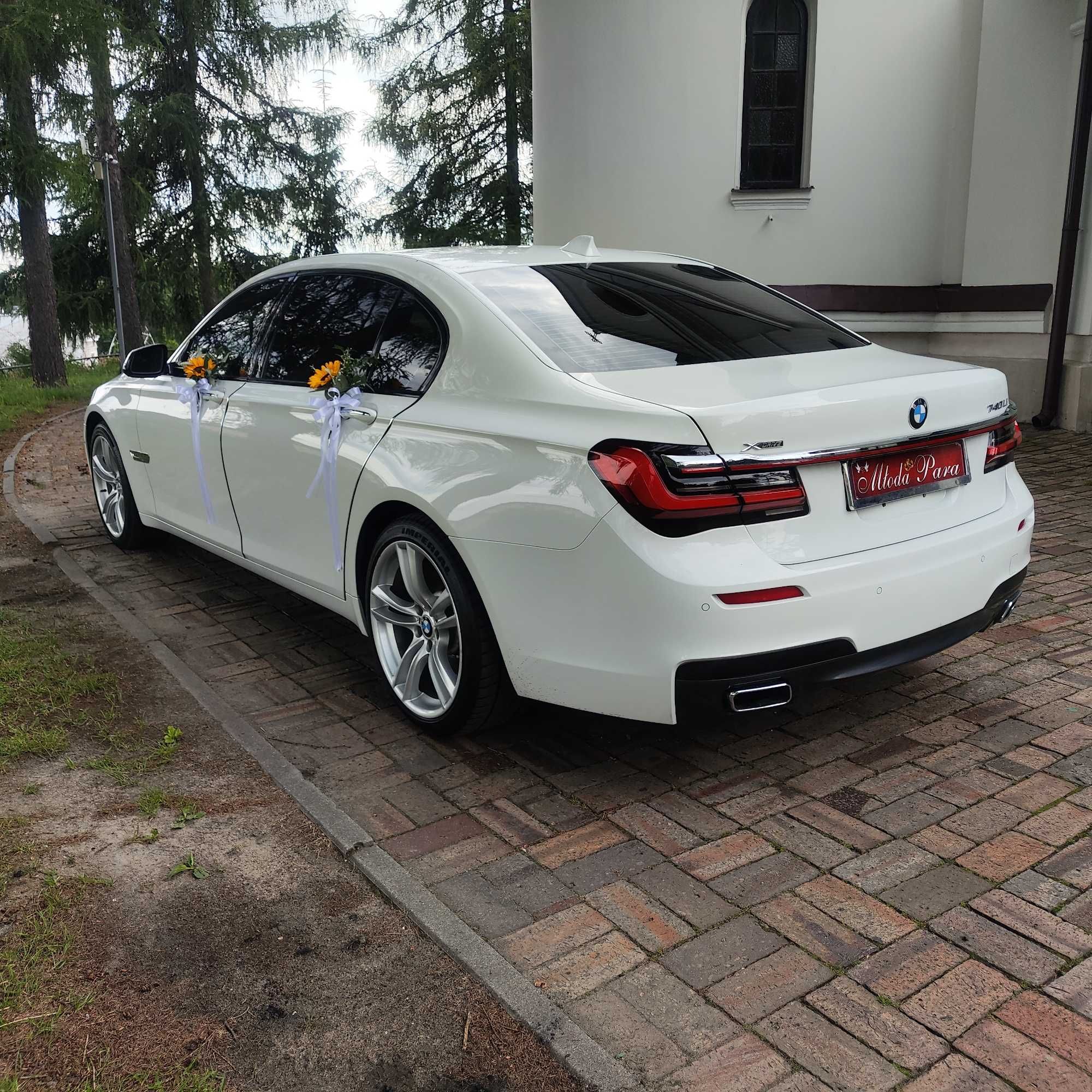 Białe auto do ślubu BMW Serii 7 F01 / F02 Wynajem Ślub białe BMW F02