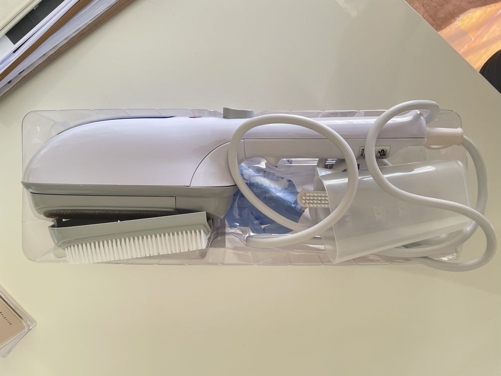 Ferro vertical a vapor