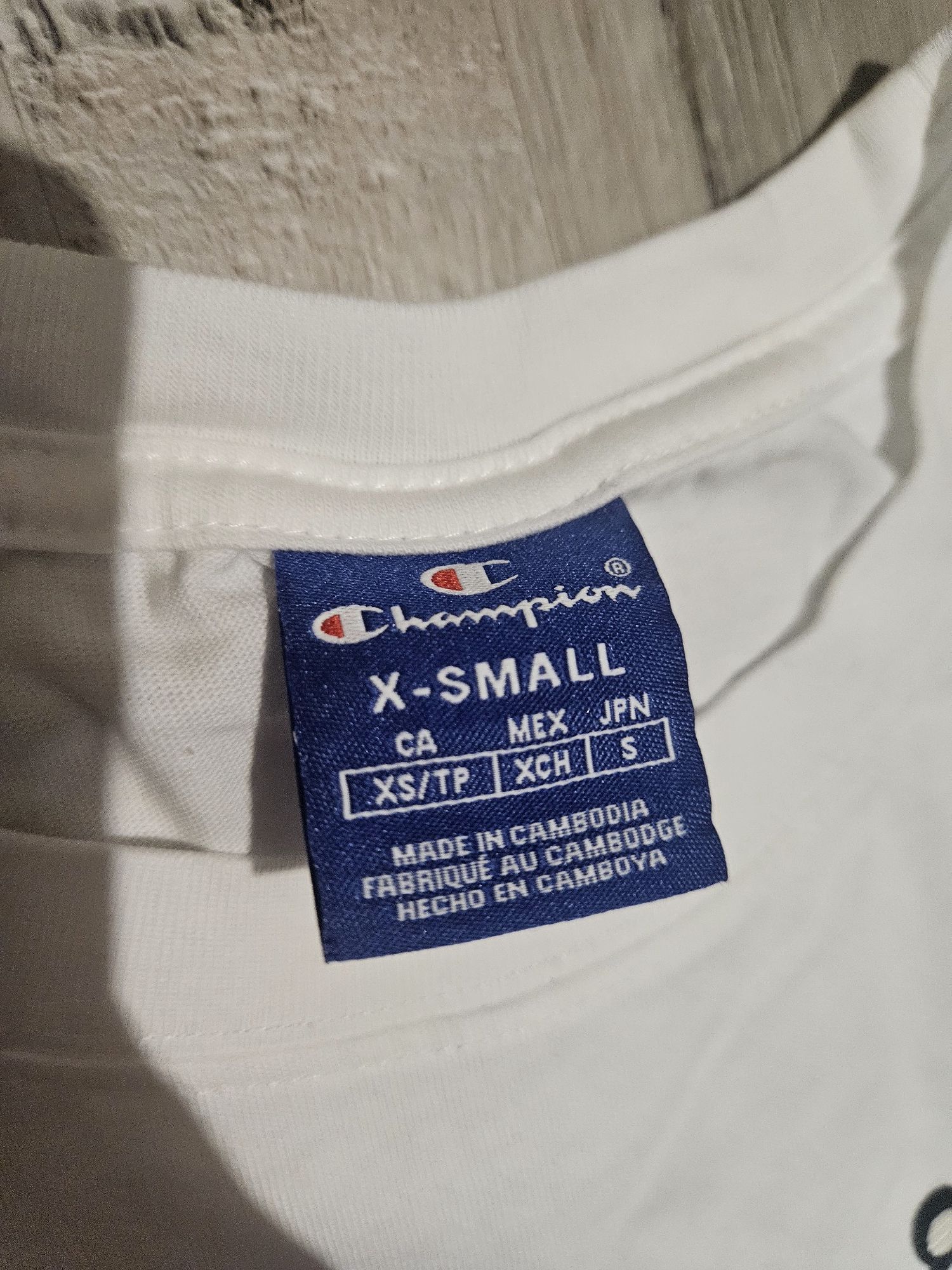 Damski t-shirt Champion.  Rozmiar XS. Stan idealny