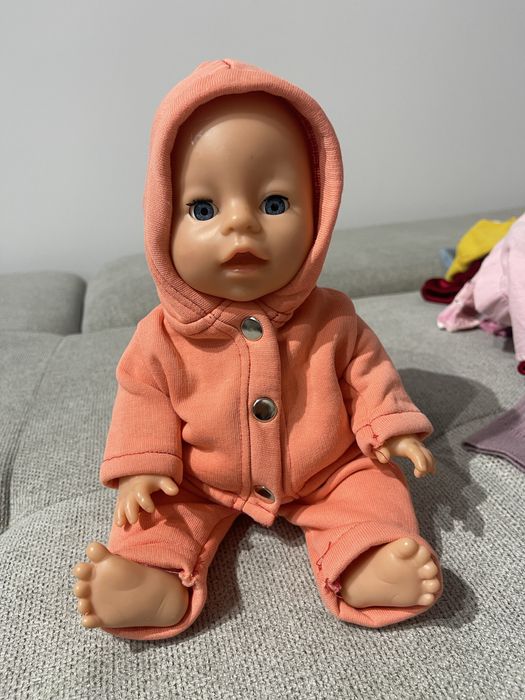 Дитячия пупс з коляскою